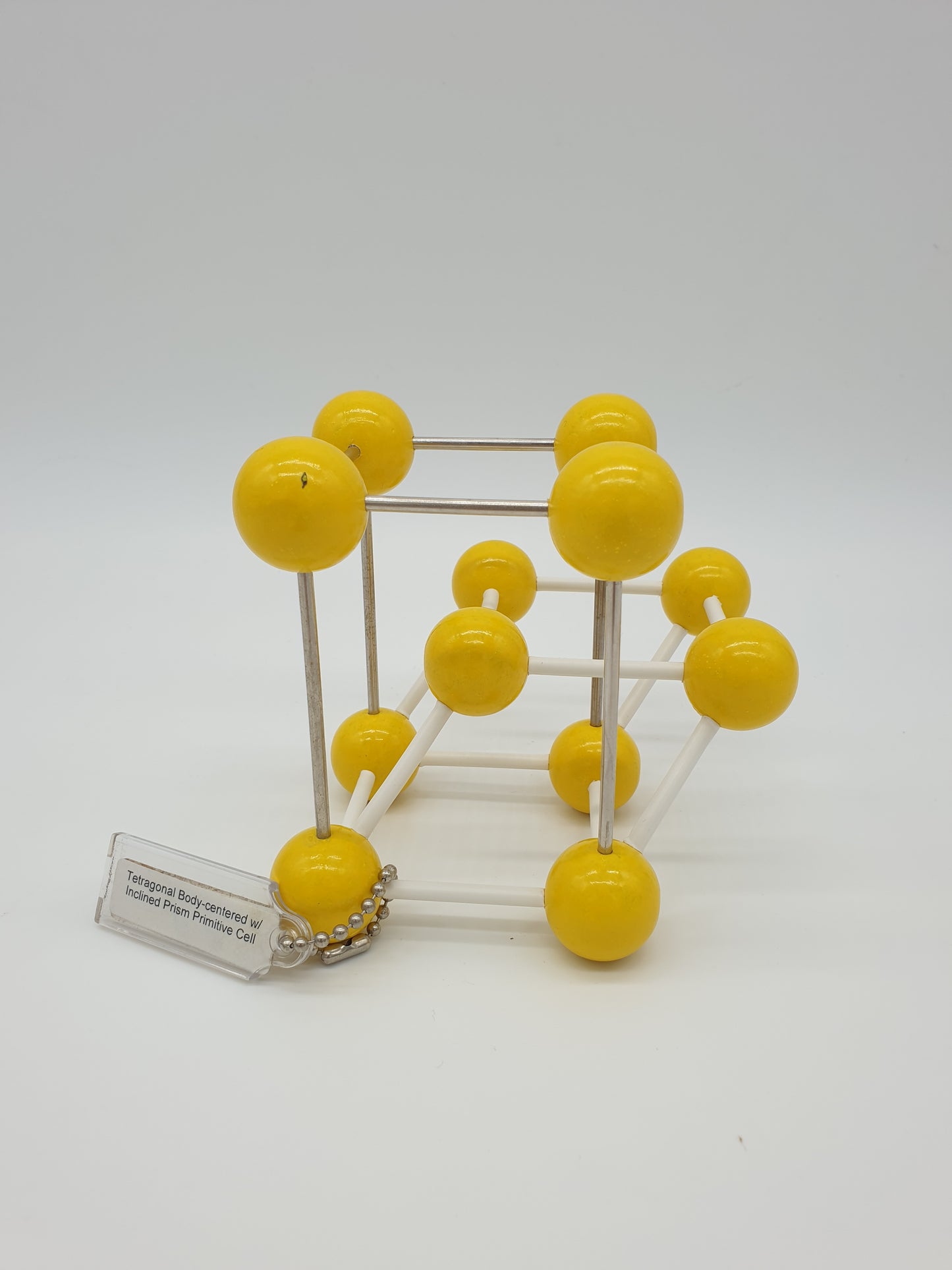 KS7998k Tetragonal Face-centered Lattice with Inclined Prism as Primitive Cell