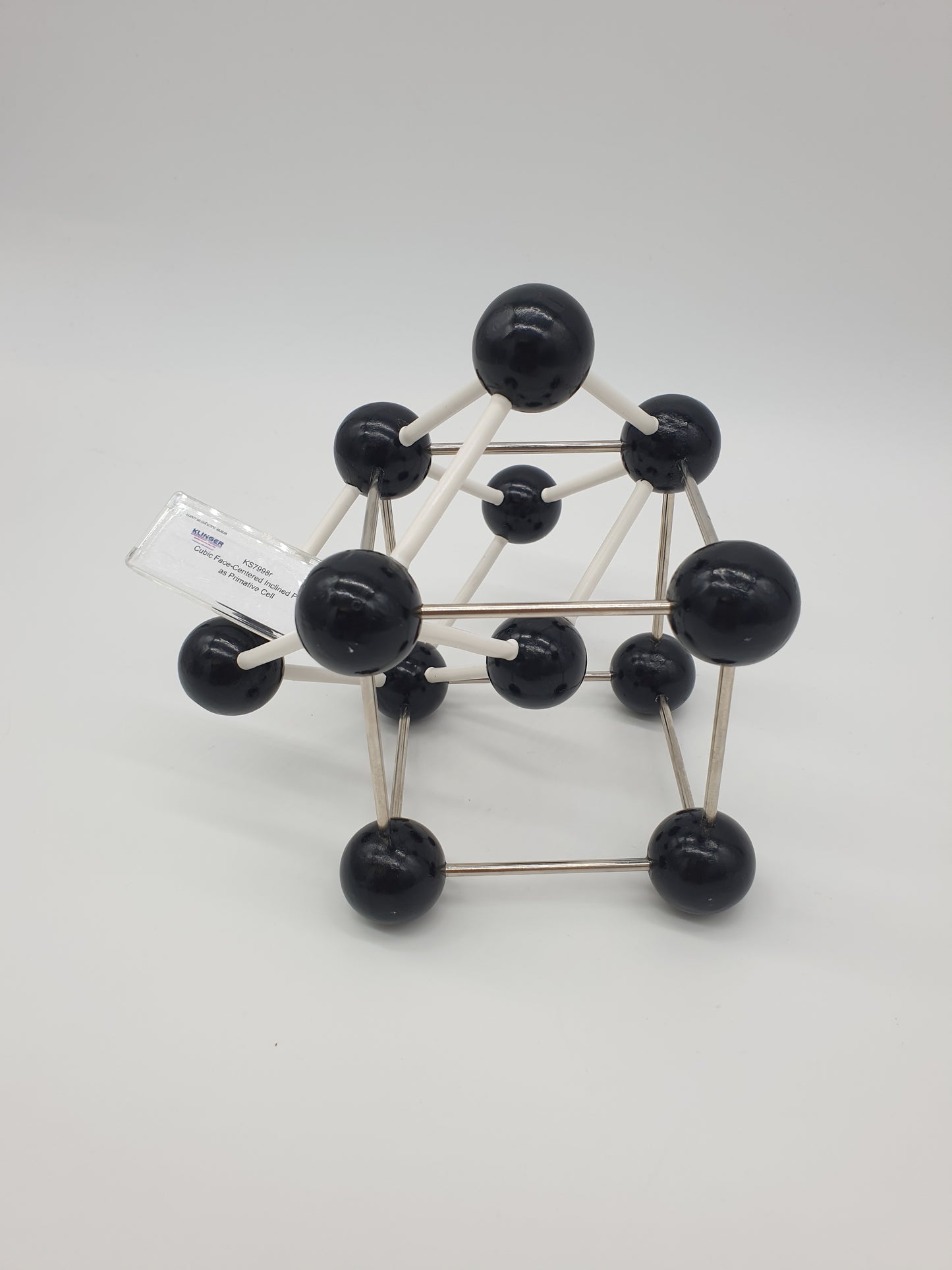 KS7998r Cubic Face-centered Lattice with Inclined Prism as Primitive Cell